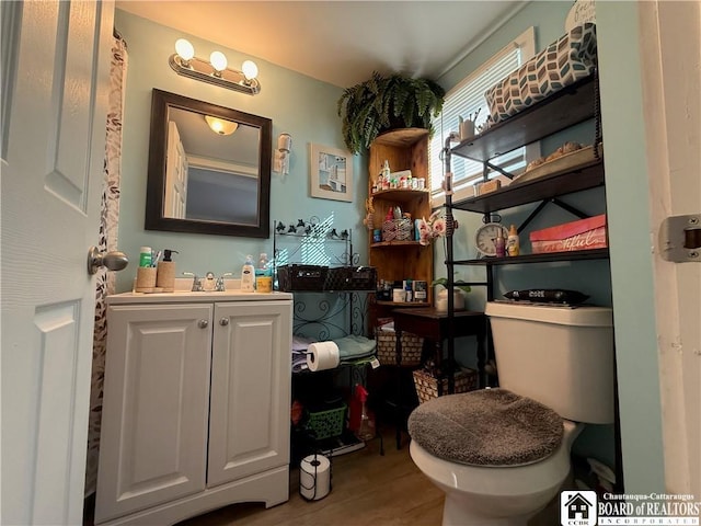 421 E Connell St, Olean-City, NY 14760 - bathroom with wood finished floors and vanity