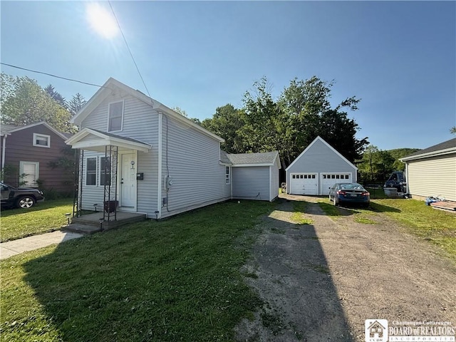 421 E Connell St, Olean-City, NY 14760 - view of front of home with a garage, an outdoor structure, and a front yard