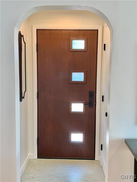 17 Benton Cir, New Hartford, NY 13501 - entryway featuring arched walkways and baseboards