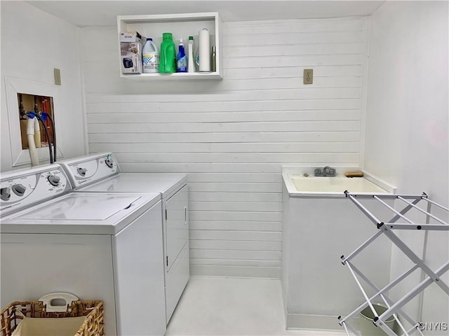 17 Benton Cir, New Hartford, NY 13501 - laundry room with separate washer and dryer and wooden walls