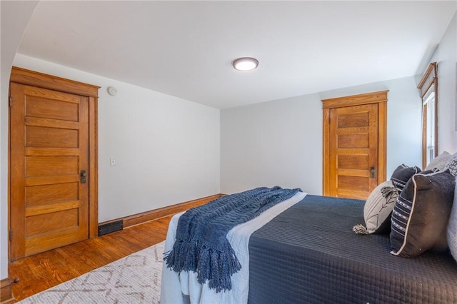234 Depew St, Rochester, NY 14611 - bedroom featuring wood finished floors and baseboards