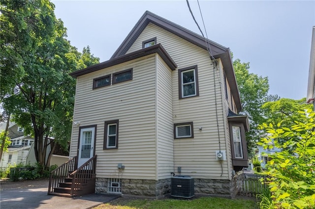 234 Depew St, Rochester, NY 14611 - rear view of house featuring entry steps