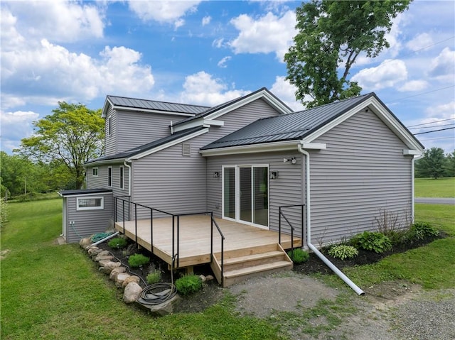 3228 County Road 28, Reading, NY 14891 - back of house featuring a yard, a deck, a metal roof, and a standing seam roof
