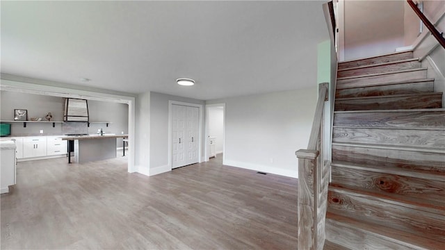 3228 County Road 28, Reading, NY 14891 - stairs with wood finished floors and baseboards