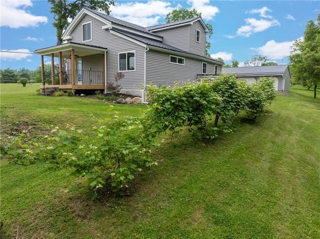 3228 County Road 28, Reading, NY 14891 - back of property featuring a lawn and a porch