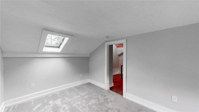3228 County Road 28, Reading, NY 14891 - additional living space featuring a skylight, carpet floors, and lofted ceiling