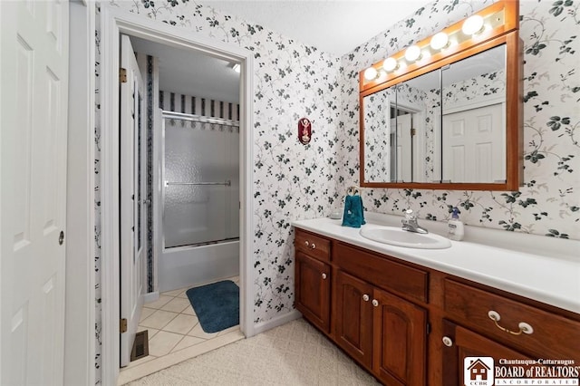 12 Ahrens Pl, Pomfret, NY 14063 - bathroom featuring wallpapered walls, vanity, bath / shower combo with glass door, and tile patterned floors