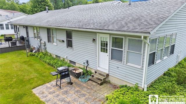 12 Ahrens Pl, Pomfret, NY 14063 - back of house featuring entry steps, a shingled roof, and a patio