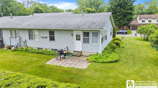 12 Ahrens Pl, Pomfret, NY 14063 - back of house with entry steps, a shingled roof, a patio area, and a yard