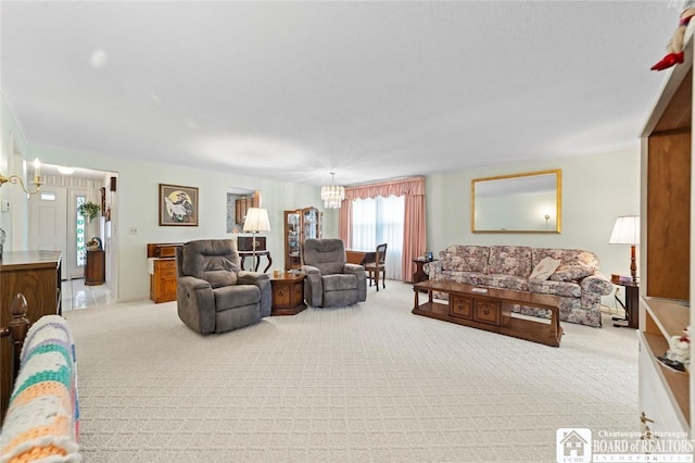 12 Ahrens Pl, Pomfret, NY 14063 - living room with a chandelier and light carpet