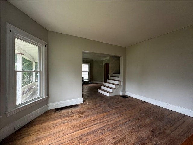14 Sherman St, Bradford-City, PA 16701 - unfurnished room with wood finished floors and stairway