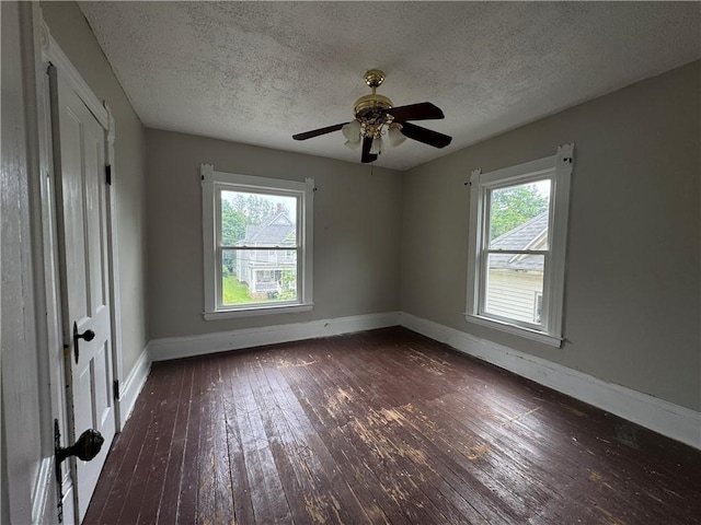 14 Sherman St, Bradford-City, PA 16701 - unfurnished bedroom featuring dark wood-style flooring, a textured ceiling, and a ceiling fan