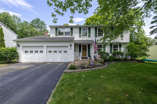208 Blackwell Ln, Henrietta, NY 14467 - view of front of property featuring driveway, a front lawn, and an attached garage