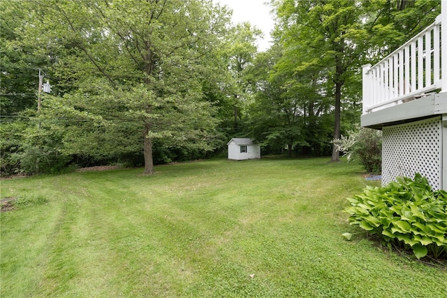 208 Blackwell Ln, Henrietta, NY 14467 - view of green lawn featuring a shed