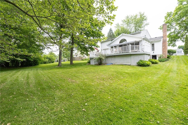 208 Blackwell Ln, Henrietta, NY 14467 - view of green lawn with a deck
