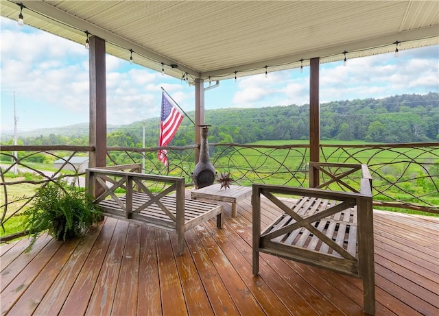 377 Bingham Center Rd, Bingham, PA 16923 - wooden deck featuring a wooded view