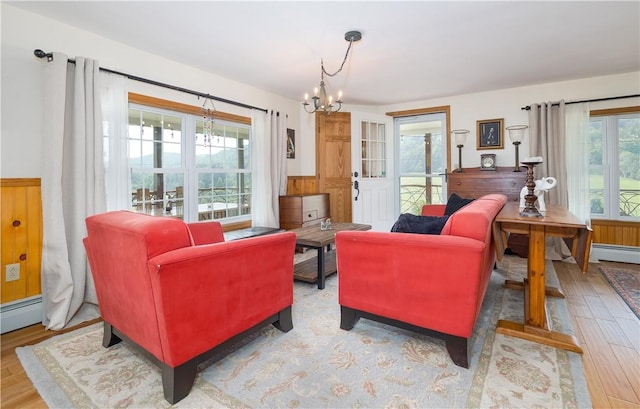 377 Bingham Center Rd, Bingham, PA 16923 - living area featuring a chandelier and wood finished floors