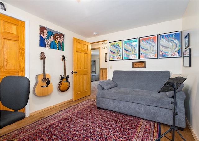 377 Bingham Center Rd, Bingham, PA 16923 - living room featuring wood finished floors and baseboards