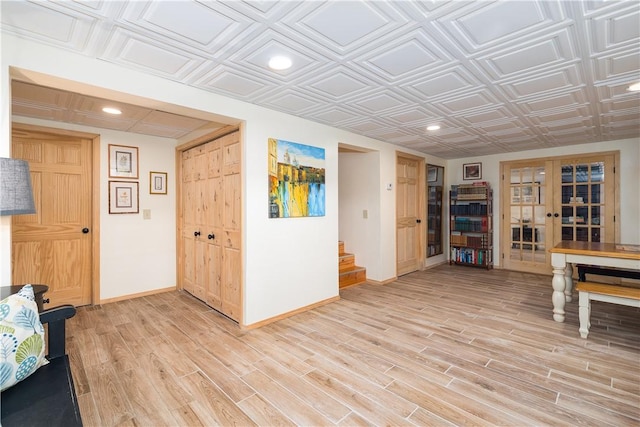 377 Bingham Center Rd, Bingham, PA 16923 - sitting room featuring french doors, stairway, light wood-type flooring, recessed lighting, and an ornate ceiling