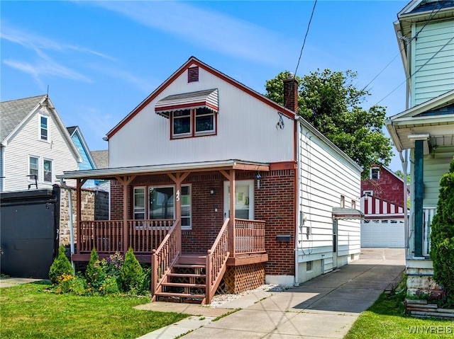 45 Eckhert St, Buffalo, NY 14207 - view of front facade featuring a porch, an outbuilding, a chimney, and brick siding