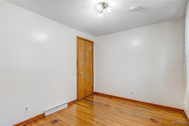 45 Eckhert St, Buffalo, NY 14207 - spare room with light wood-style floors and a smoke detector