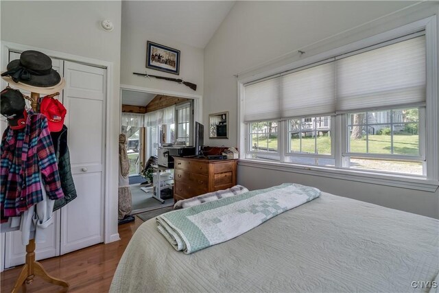 6685 State Route 26, Martinsburg, NY 13404 - bedroom with lofted ceiling and wood finished floors