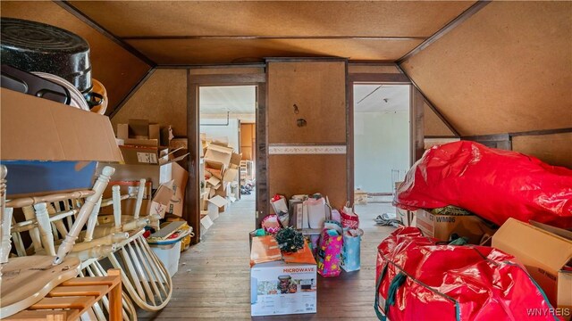 2009 Seneca St, Buffalo, NY 14210 - additional living space with lofted ceiling and wood-type flooring