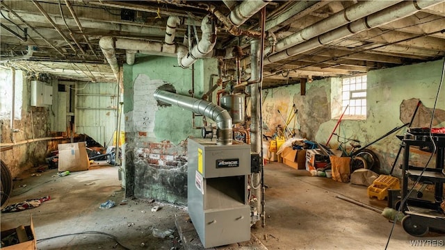 2009 Seneca St, Buffalo, NY 14210 - below grade area featuring electric panel and a heating unit