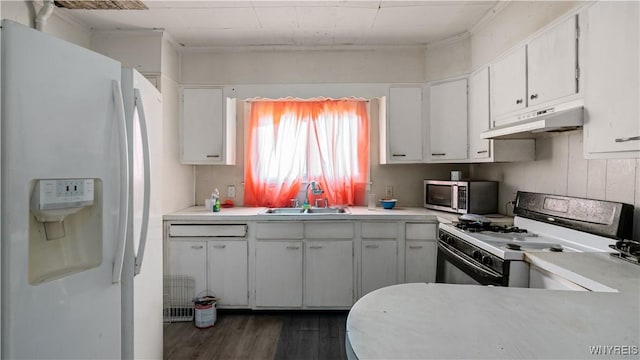 2009 Seneca St, Buffalo, NY 14210 - kitchen featuring white appliances, under cabinet range hood, dark wood-style flooring, light countertops, and white cabinetry