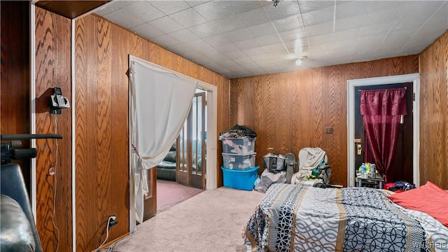 2009 Seneca St, Buffalo, NY 14210 - carpeted bedroom featuring wooden walls
