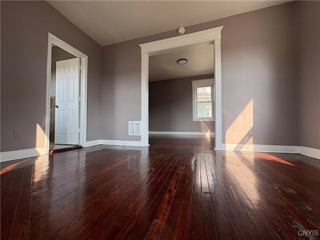 918 Shaw St, Utica, NY 13502 - empty room featuring hardwood / wood-style floors and a smoke detector