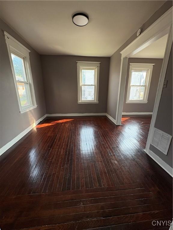 918 Shaw St, Utica, NY 13502 - unfurnished room with hardwood / wood-style flooring and baseboards