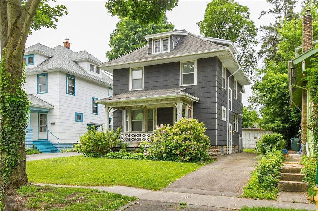 77 Macbeth St, Rochester, NY 14609 - traditional style home featuring covered porch, a front yard, and roof with shingles