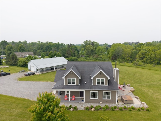 4582 Belwood Dr, Geneseo, NY 14454 - back of house featuring a yard, covered porch, and a chimney