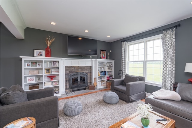 4582 Belwood Dr, Geneseo, NY 14454 - living area featuring wood finished floors, a brick fireplace, recessed lighting, and vaulted ceiling