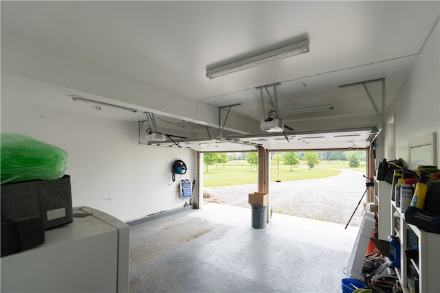 4582 Belwood Dr, Geneseo, NY 14454 - garage featuring a garage door opener