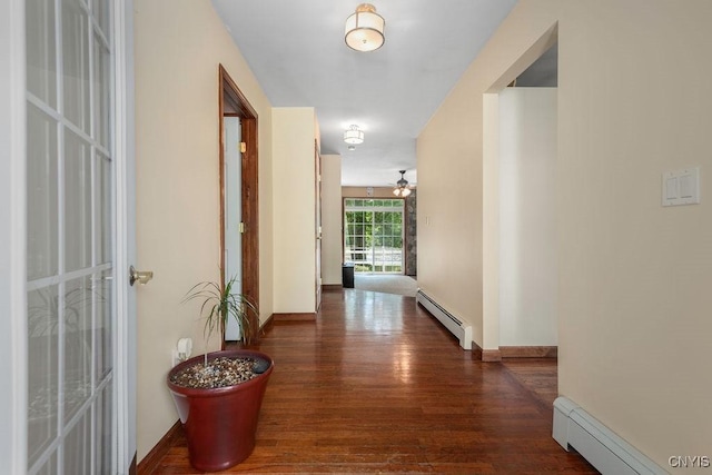 98 Krystyna Ln Unit 6, Cato, NY 13080 - hall with a baseboard heating unit and wood finished floors