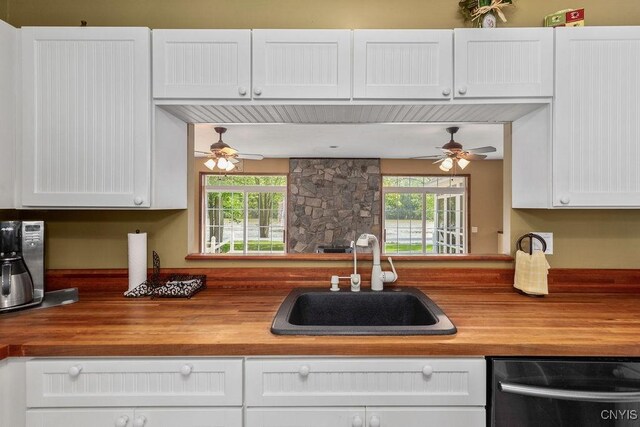 98 Krystyna Ln Unit 6, Cato, NY 13080 - kitchen featuring wood counters, dishwasher, ceiling fan, and plenty of natural light