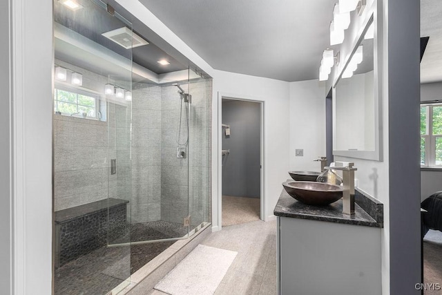 98 Krystyna Ln Unit 6, Cato, NY 13080 - bathroom featuring a shower stall and double vanity