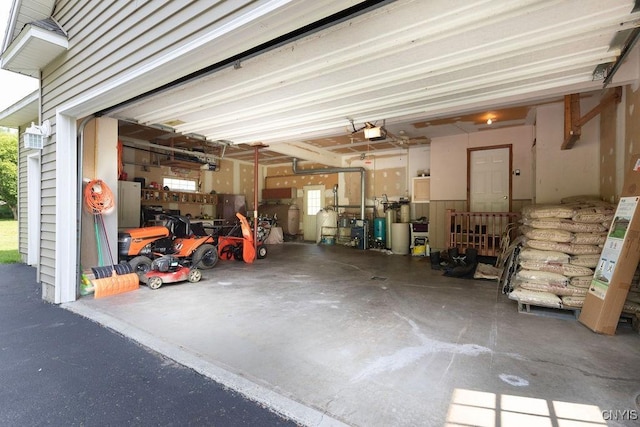 98 Krystyna Ln Unit 6, Cato, NY 13080 - garage featuring a garage door opener