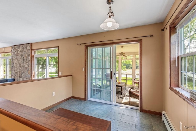 98 Krystyna Ln Unit 6, Cato, NY 13080 - entryway featuring a baseboard radiator, healthy amount of natural light, and tile patterned floors
