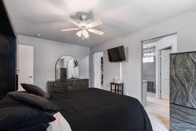 98 Krystyna Ln Unit 6, Cato, NY 13080 - bedroom featuring a ceiling fan, connected bathroom, and light colored carpet