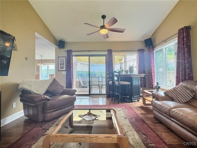7530 Song Lake Rd, Preble, NY 13159 - living area featuring lofted ceiling, plenty of natural light, a ceiling fan, a chandelier, and wood finished floors