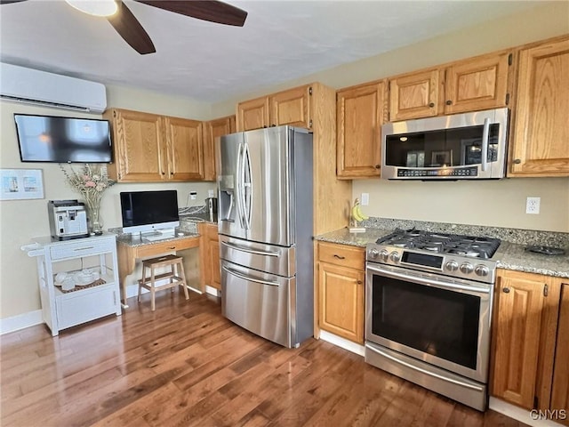 7530 Song Lake Rd, Preble, NY 13159 - kitchen featuring appliances with stainless steel finishes, a wall unit AC, ceiling fan, wood finished floors, and an office area