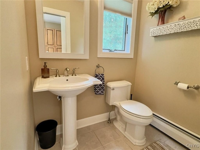 7530 Song Lake Rd, Preble, NY 13159 - bathroom featuring a baseboard heating unit and tile patterned floors