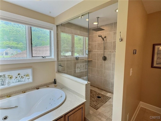 7530 Song Lake Rd, Preble, NY 13159 - bathroom with a tub with jets, a tile shower, and plenty of natural light