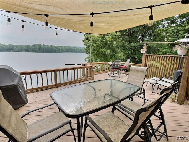 7530 Song Lake Rd, Preble, NY 13159 - wooden deck with outdoor dining space, a water view, and area for grilling