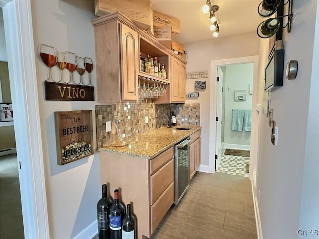 7530 Song Lake Rd, Preble, NY 13159 - indoor wet bar with tasteful backsplash, dishwasher, and light floors