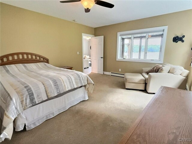 7530 Song Lake Rd, Preble, NY 13159 - bedroom featuring baseboard heating, carpet floors, and ceiling fan