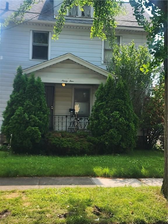 94 Wetmore Park, Rochester, NY 14606 - view of front of property featuring a porch and a front yard